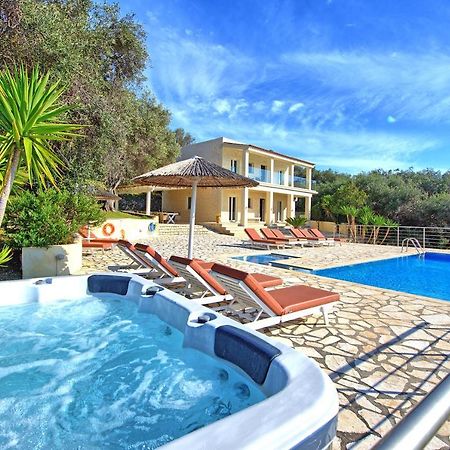 Beachfront Villa Seasun By Posarellivillas Ájos Spyrídon Eksteriør bilde