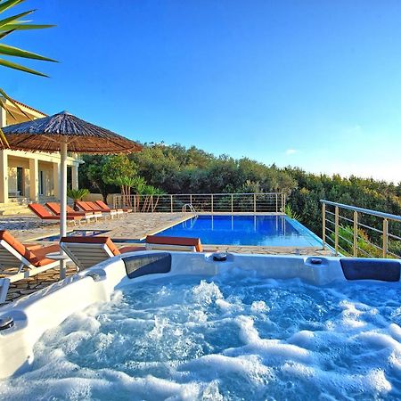 Beachfront Villa Seasun By Posarellivillas Ájos Spyrídon Eksteriør bilde