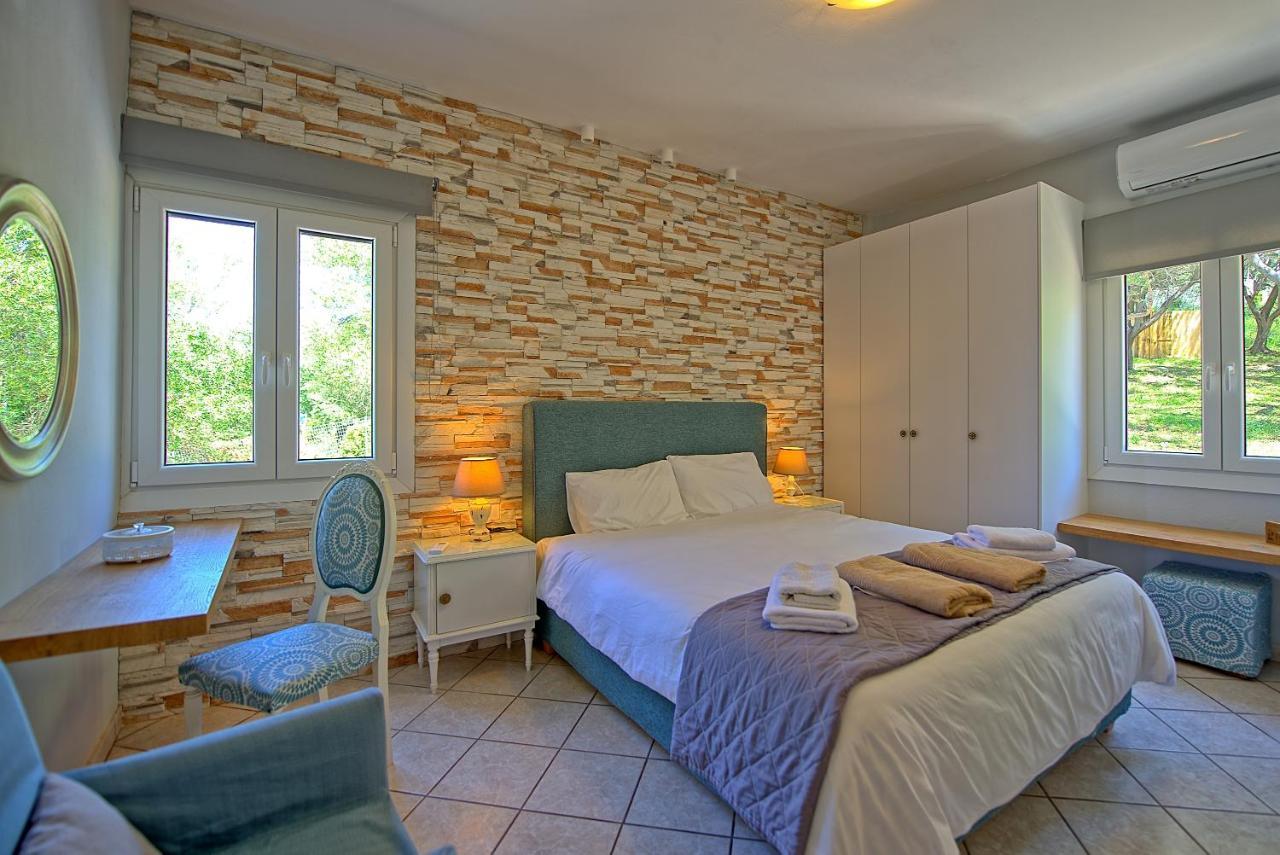 Beachfront Villa Seasun By Posarellivillas Ájos Spyrídon Eksteriør bilde