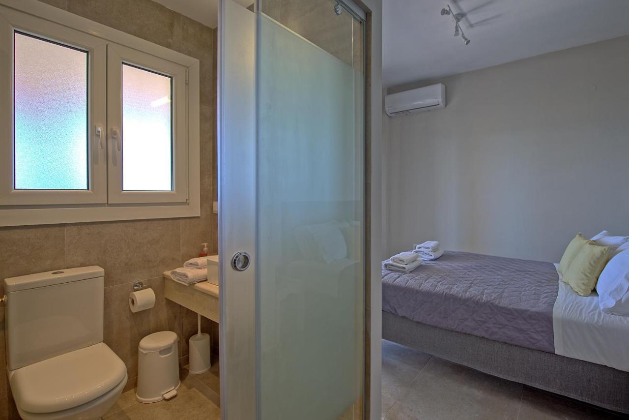 Beachfront Villa Seasun By Posarellivillas Ájos Spyrídon Eksteriør bilde