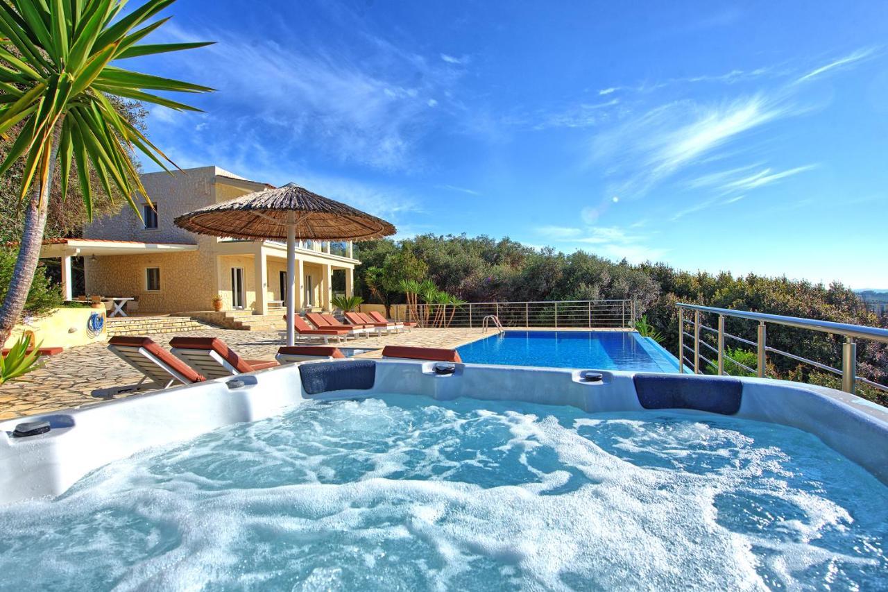 Beachfront Villa Seasun By Posarellivillas Ájos Spyrídon Eksteriør bilde