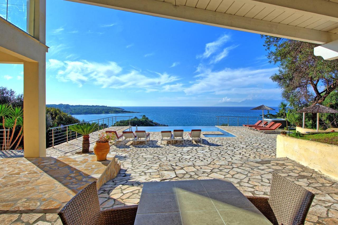 Beachfront Villa Seasun By Posarellivillas Ájos Spyrídon Eksteriør bilde