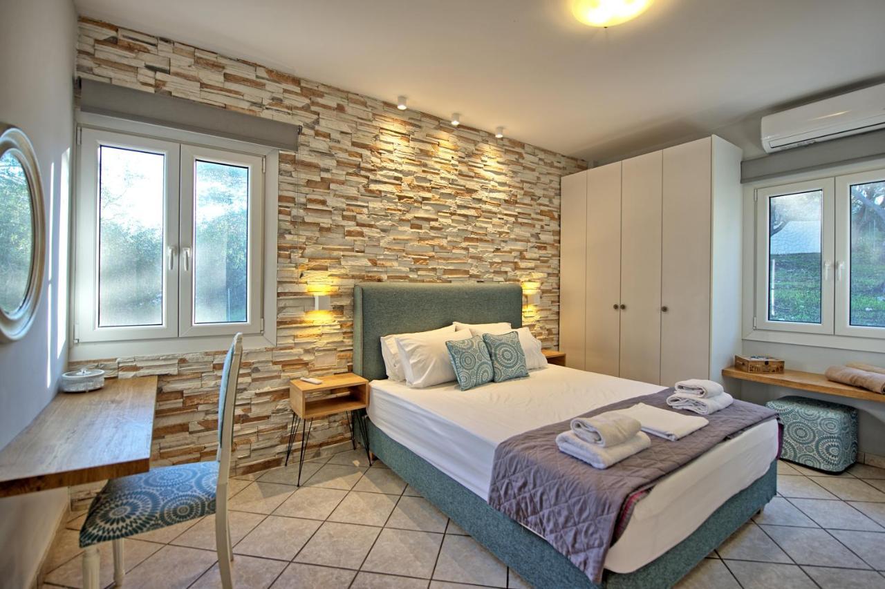 Beachfront Villa Seasun By Posarellivillas Ájos Spyrídon Eksteriør bilde