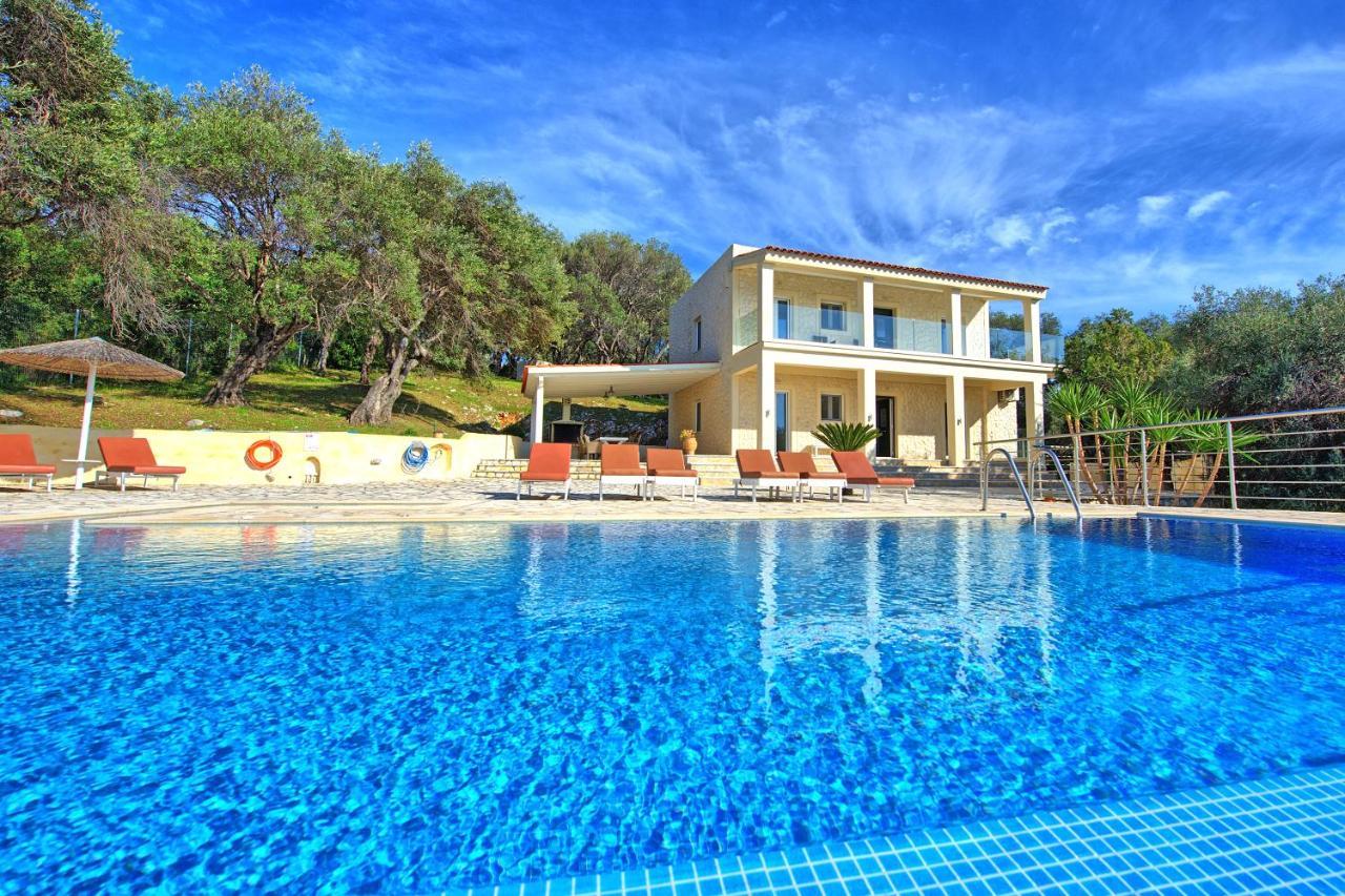 Beachfront Villa Seasun By Posarellivillas Ájos Spyrídon Eksteriør bilde