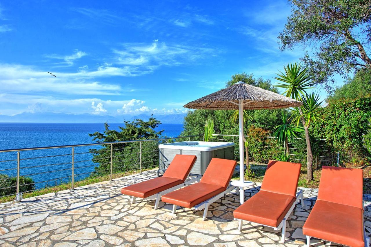 Beachfront Villa Seasun By Posarellivillas Ájos Spyrídon Eksteriør bilde