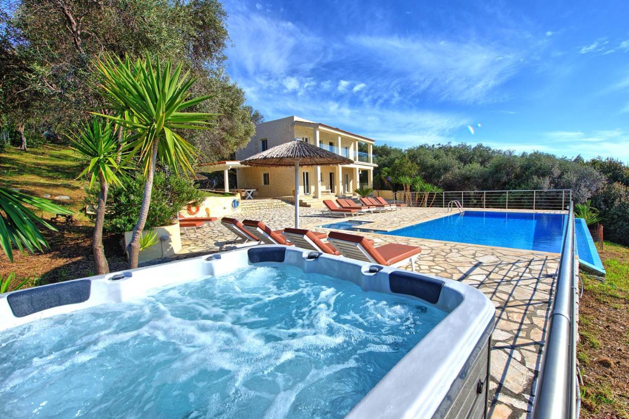 Beachfront Villa Seasun By Posarellivillas Ájos Spyrídon Eksteriør bilde