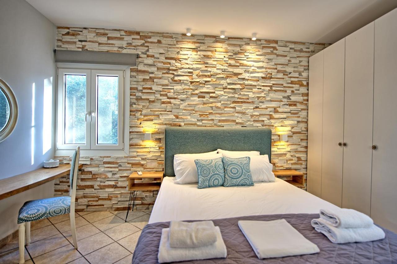 Beachfront Villa Seasun By Posarellivillas Ájos Spyrídon Eksteriør bilde